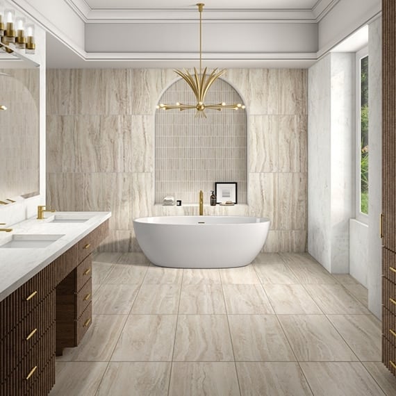 Spa bathroom clad in travertine stone with a freestanding tub