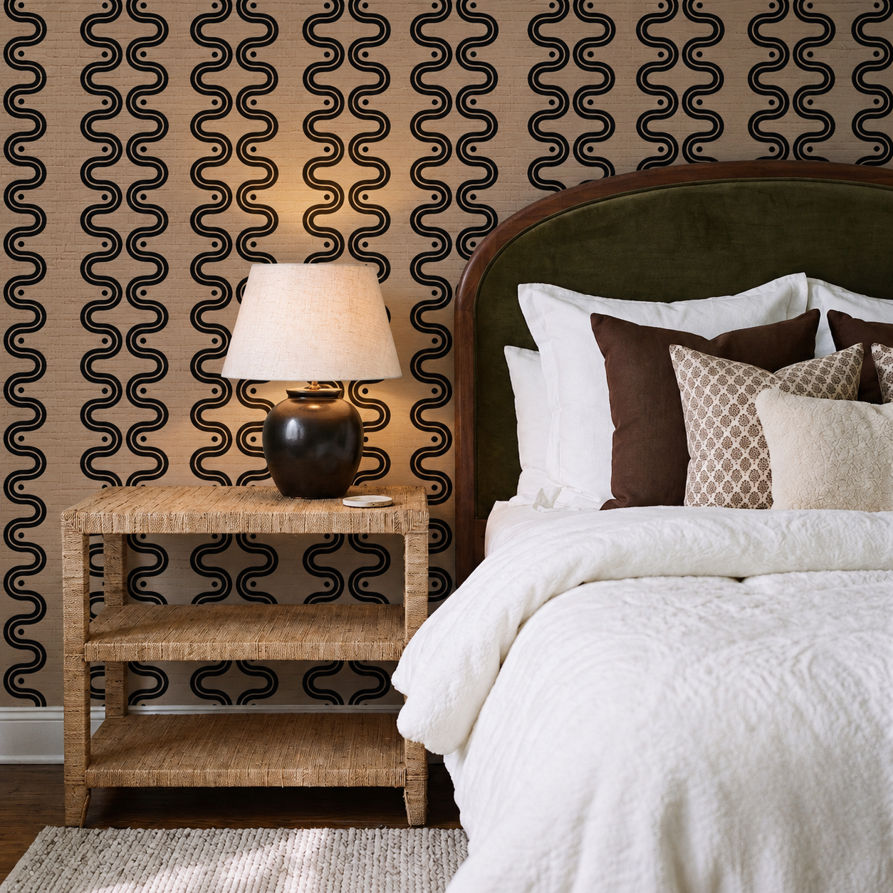 Bedroom with textured grasscloth wallpaper and an upholstered headboard